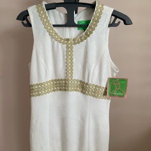 White and gold sleeveless dress above knee length